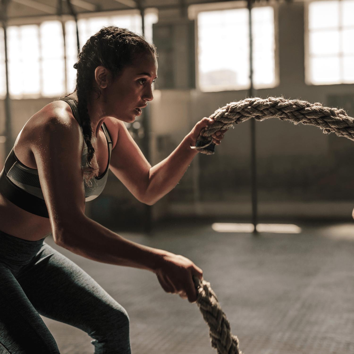 Woman working out with Rope - Conditioning Equipment A2S Fitness Homepage
